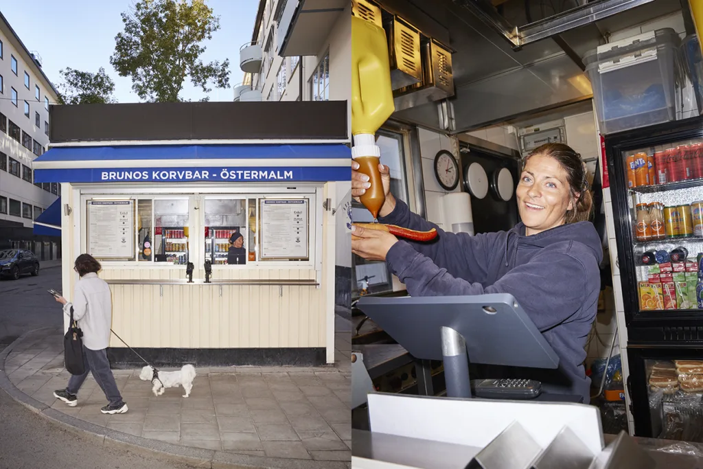 En gatuvy av Brunos Korvbar korvkiosk med en person som rastar en vit hund och en leende kvinna som förbereder en varmkorv med senap och ketchup, omgiven av matvaror och drycker.