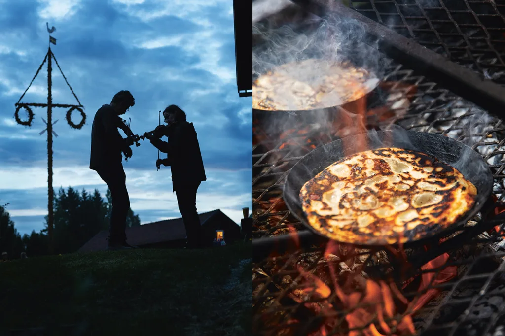 Vänster: Två personer spelar fiol nära en majstång i skymningen. Till höger i bild: Pannkakor steks i gjutjärnspannor över öppen eld, med rök som stiger upp.